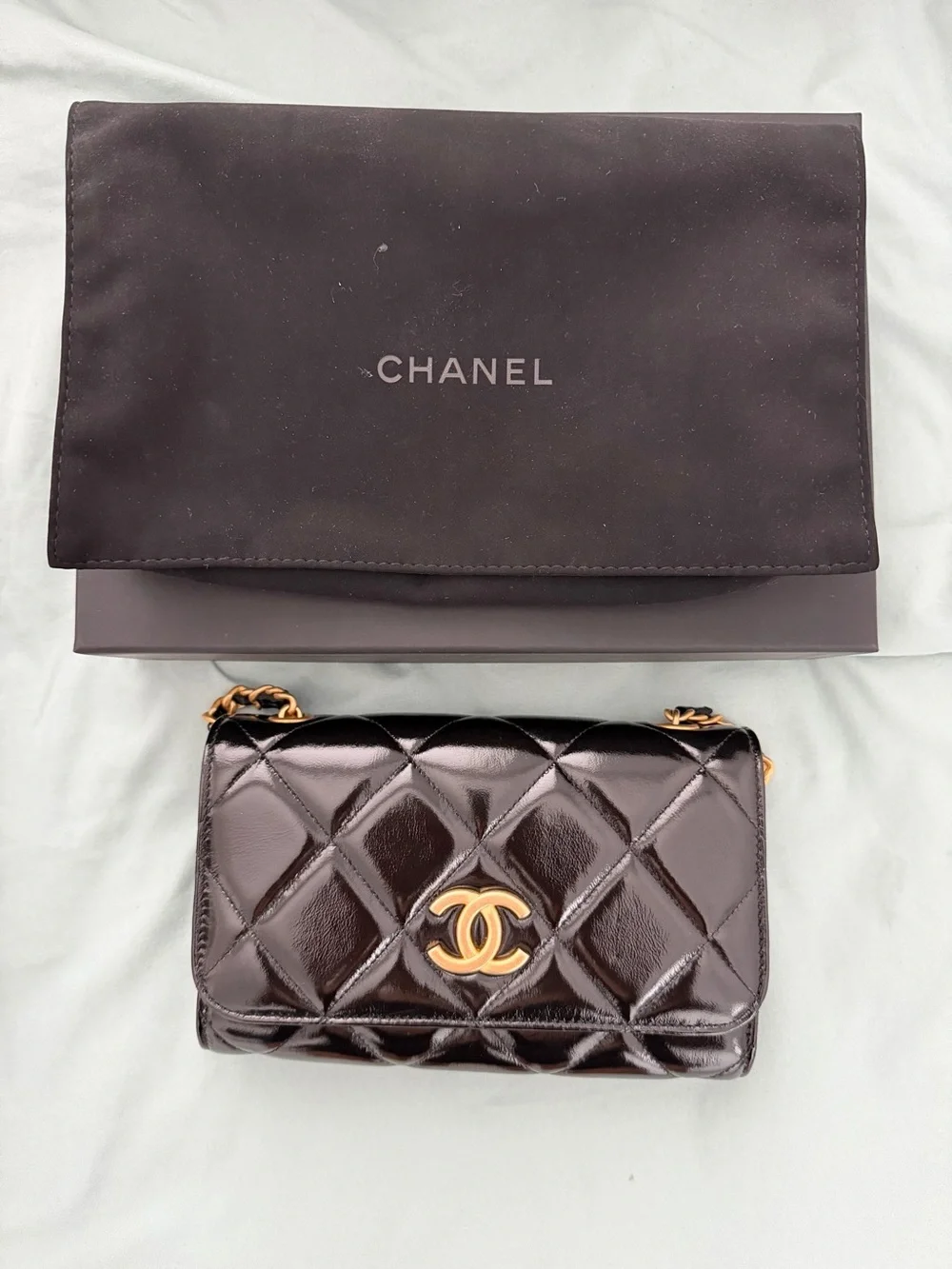 CHANEL Black Quilted Patent Leather Mini Flap with Gold Hardware